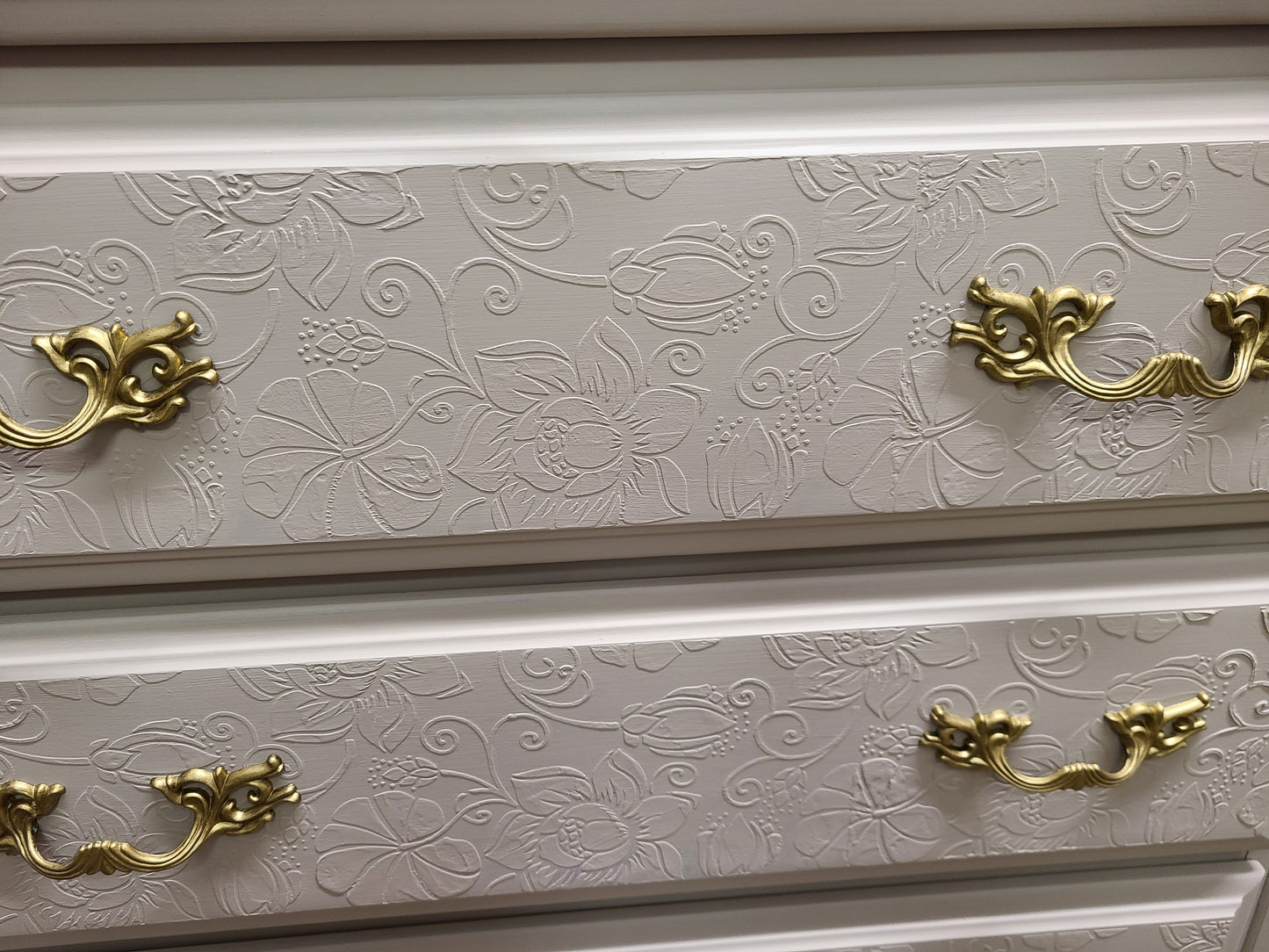 raised water lily stencil on drawer fronts